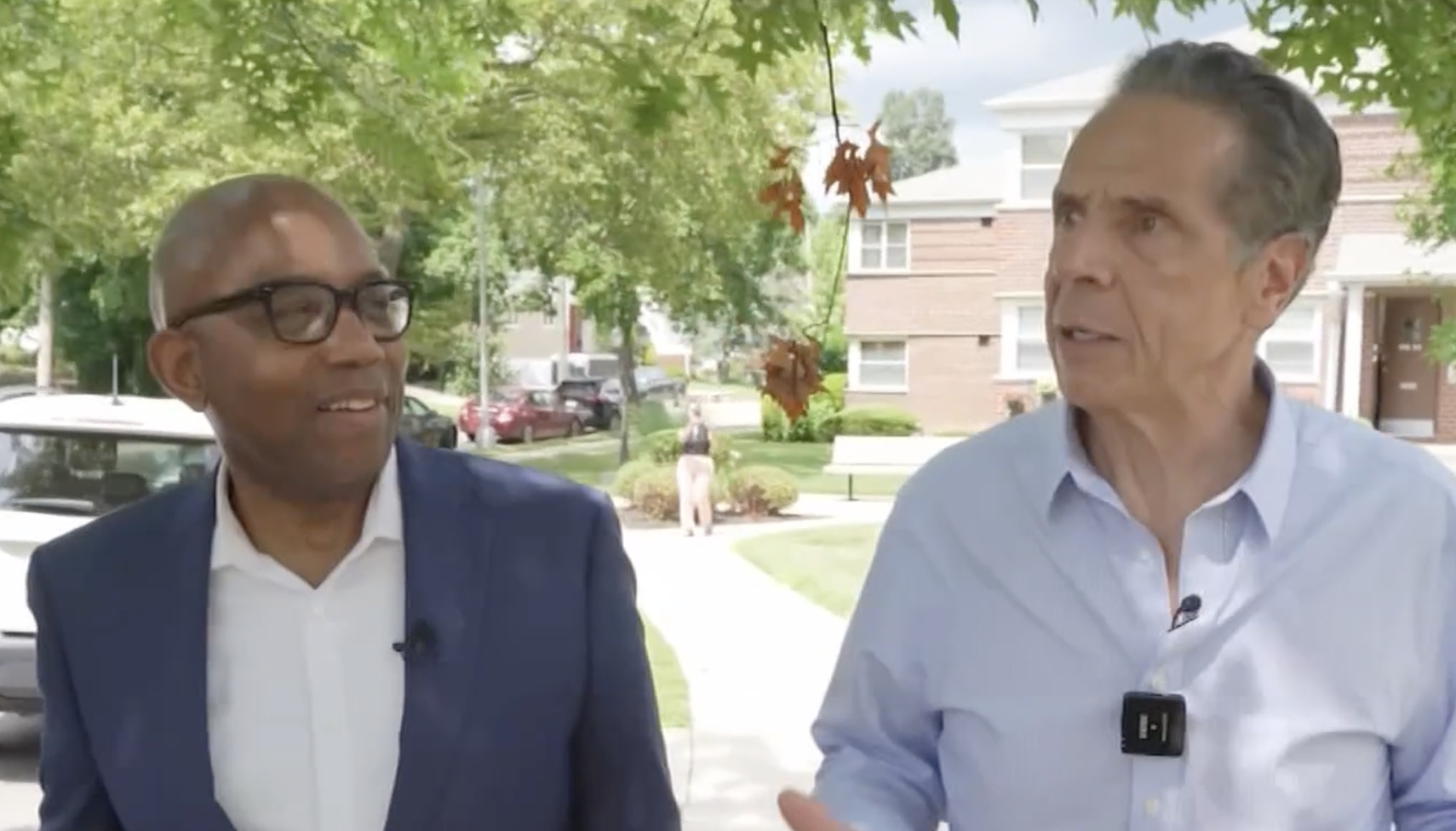 Image of Andrew Cuomo and Errol Louis walking and talking during a July 15, 2025 interview.
